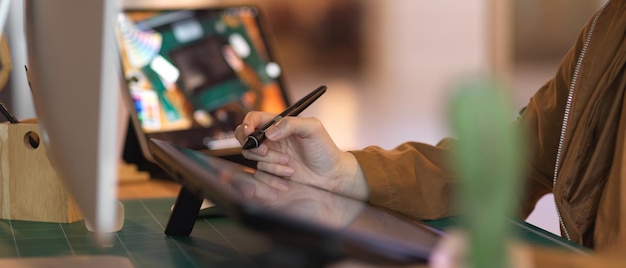 Close-up of woman working on table