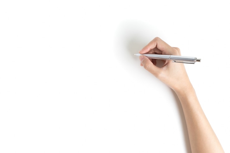 Photo close up of women arm writing with metallic pen. 