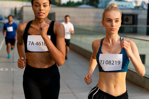 Photo close up women running together