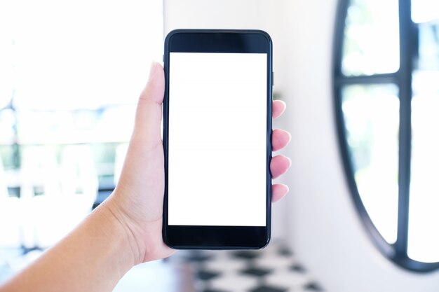 Photo close up of women's hands holding cell telephone