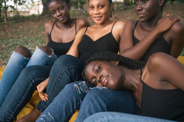 Close up women sitting outdoors