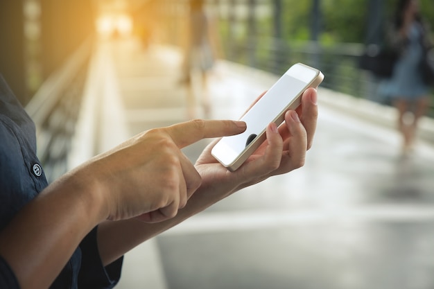 Close up of a women using mobile smart phone.online shopping concept