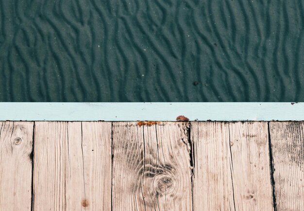 Close-up of wood against water