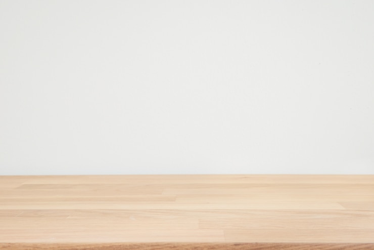 Close up wood table top on white background