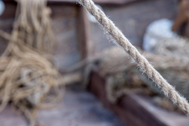 Close up wooden block and ropes