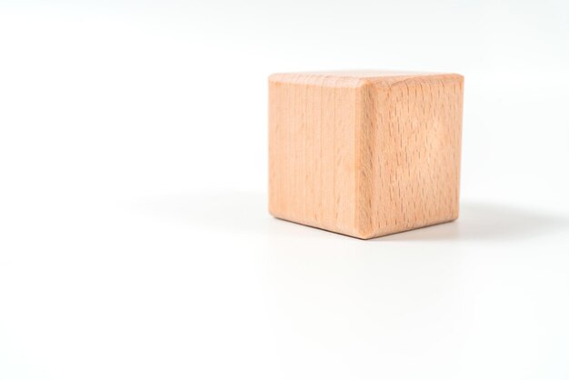 Photo close-up of wooden block over white background