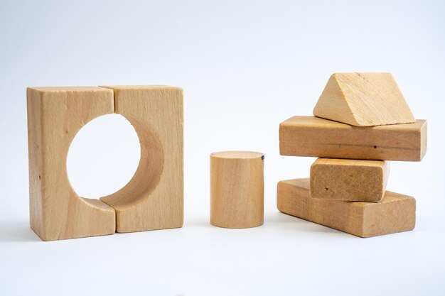 Photo close-up of wooden blocks on white background toddler brain development and creativity training