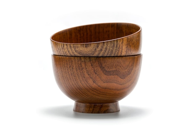 Close-up of wooden bowl on white background