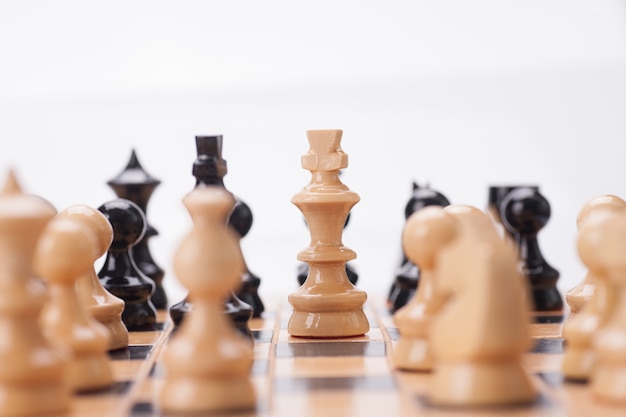 Close up Wooden Chess Pieces on Board