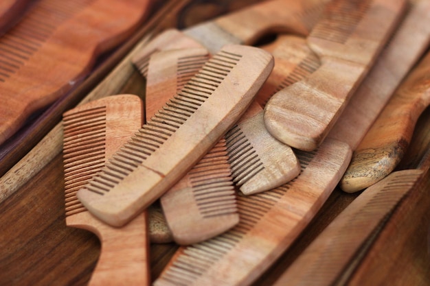 close-up of wooden combs on table