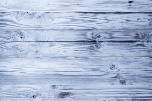 A close up of a wooden floor with the wood grain texture