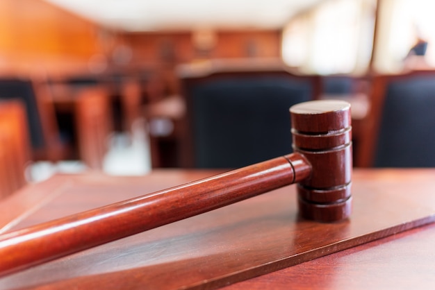 Photo close up wooden law gavel on the table justice in the courtroom