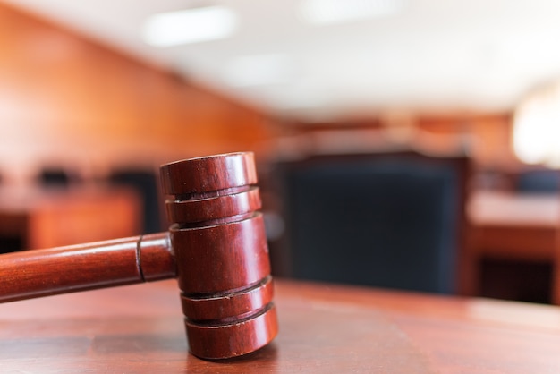 Close up Wooden Law Gavel on the Table Justice in the Courtroom