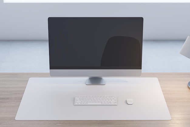 Close up of wooden office desk with empty computer monitor and\
rfeflections lamp and keyboard on blurry background 3d\
rendering