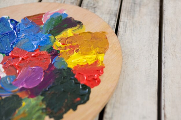 Close-up of wooden palette with various watercolor