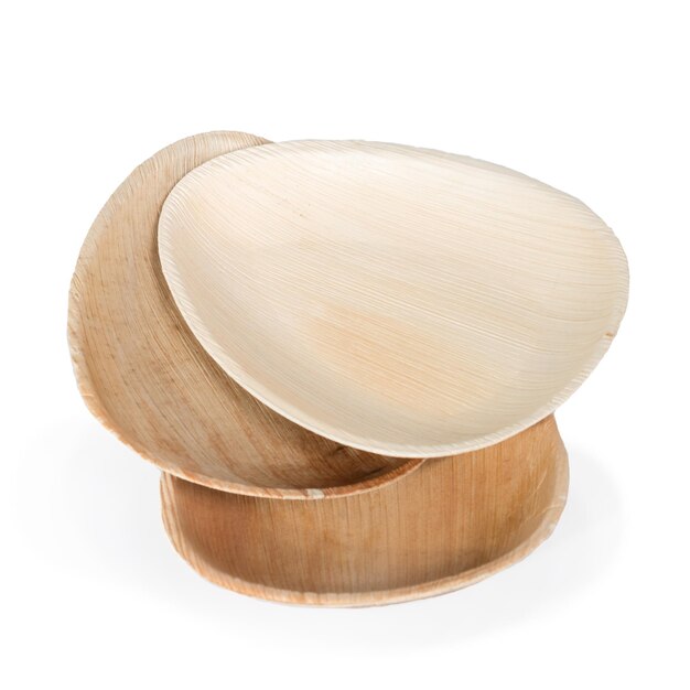 Close-up of wooden plates on white background