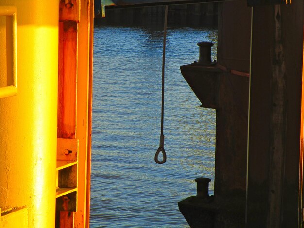 Close-up of wooden post in sea