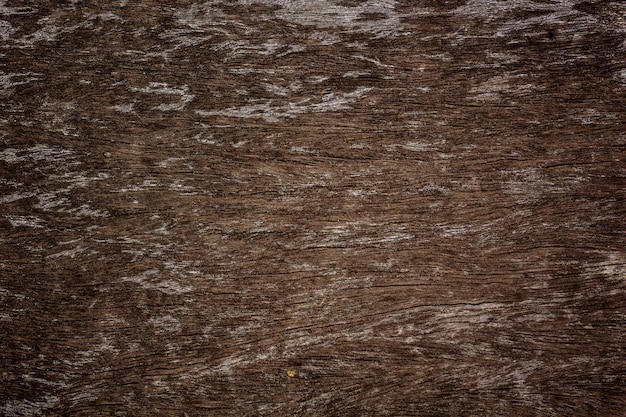 A close up of a wooden surface with a rough texture.