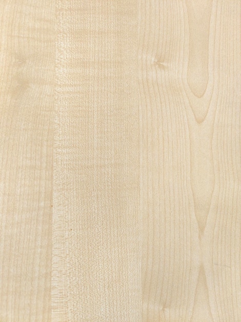 A close up of a wooden surface with a white stain.