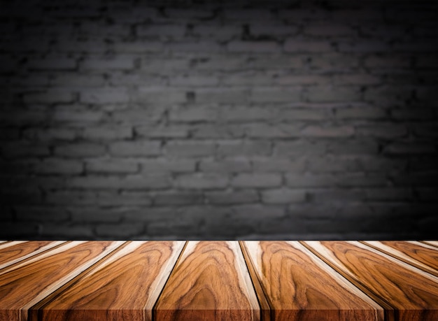 Close-up of wooden table against wall