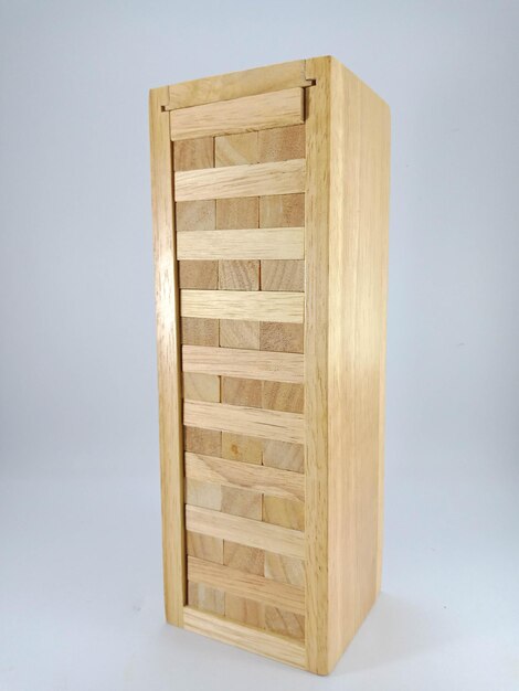 Close-up of wooden table against white background