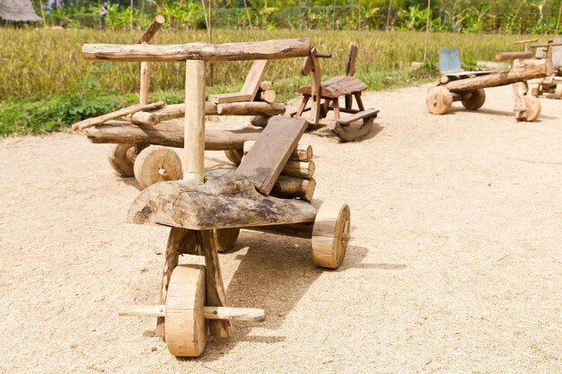 Close-up of wooden toys in park