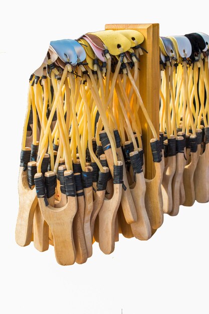 Close up of wooden wood slingshot on white background