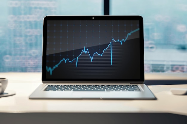 Close up of workplace with laptop computer coffee cup and growing blue financial forex chart on blurry window with city view background Stock economy market and trade concept 3D Rendering