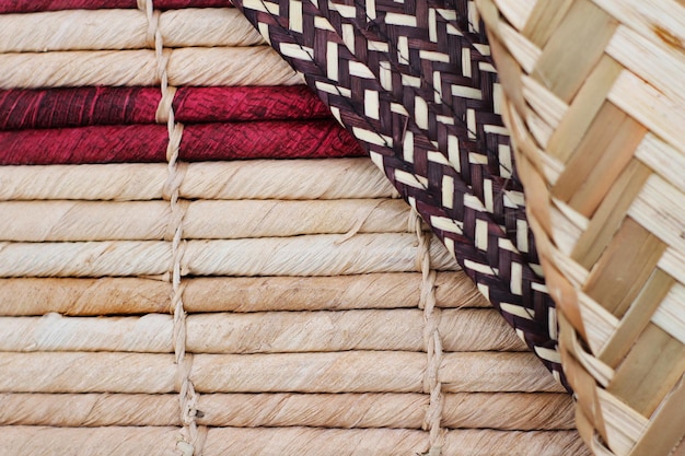 A close up of woven baskets with the word bamboo on the bottom.