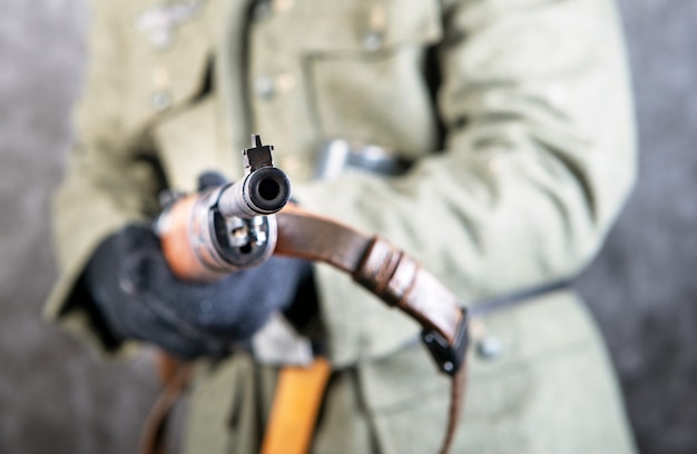 Close up of WW II German soldier with rifle