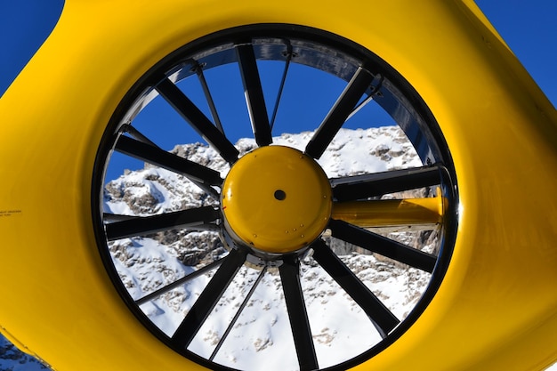 Close-up of yellow airplane against sky