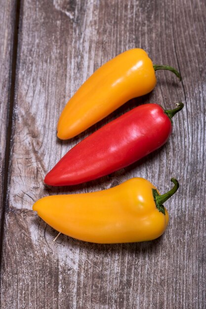 Close-up of yellow bell peppers on table