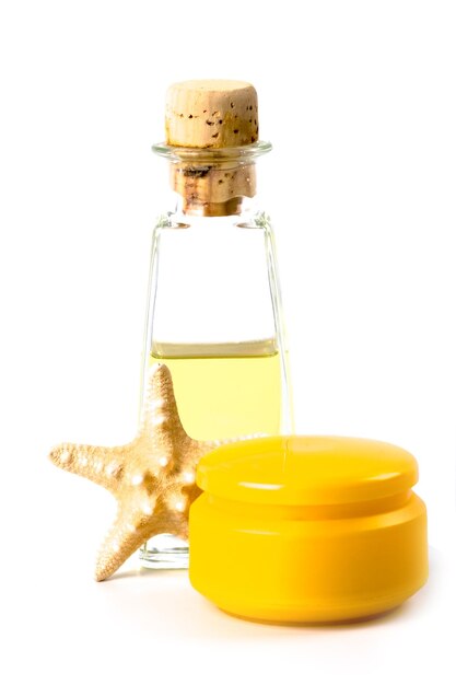 Close-up of yellow bottle against white background