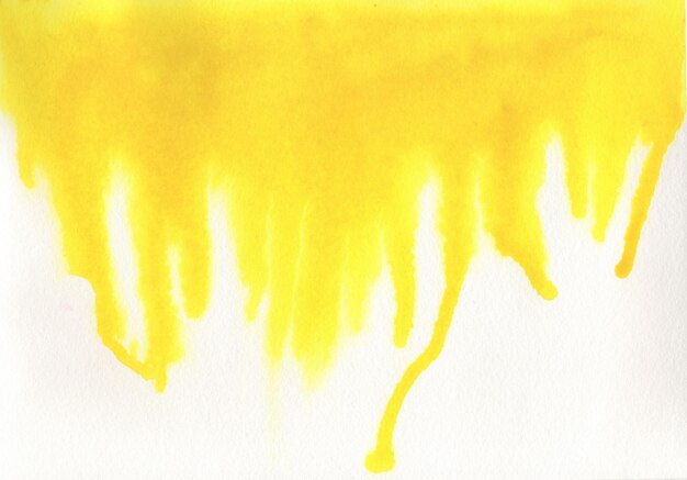 Photo close-up of yellow brush strokes on wall