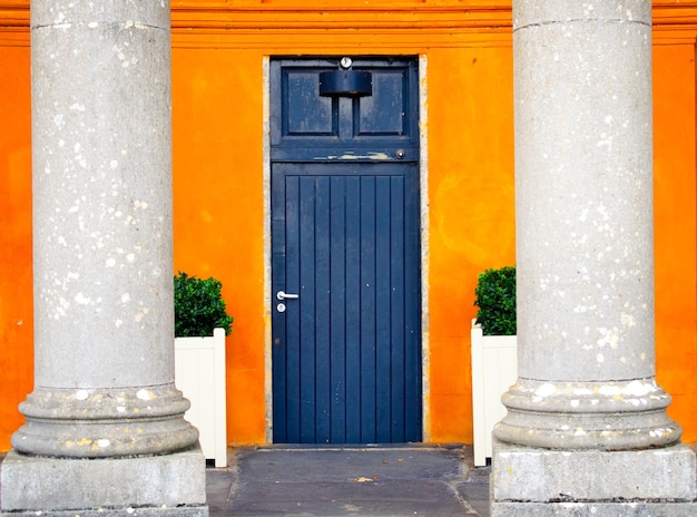 Close-up of yellow door of building