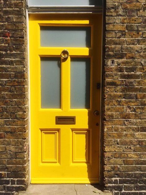 Close-up of yellow door