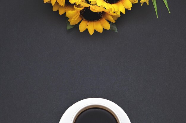 Close-up of yellow flowering plant against black background