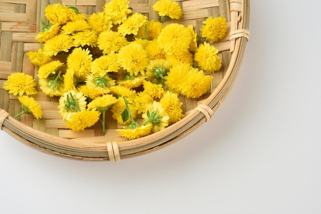 Close-up of yellow flowers in basket