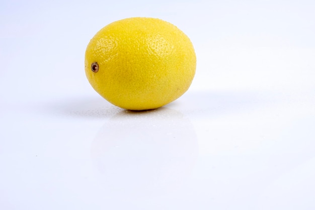 close-up of yellow fruit against white background