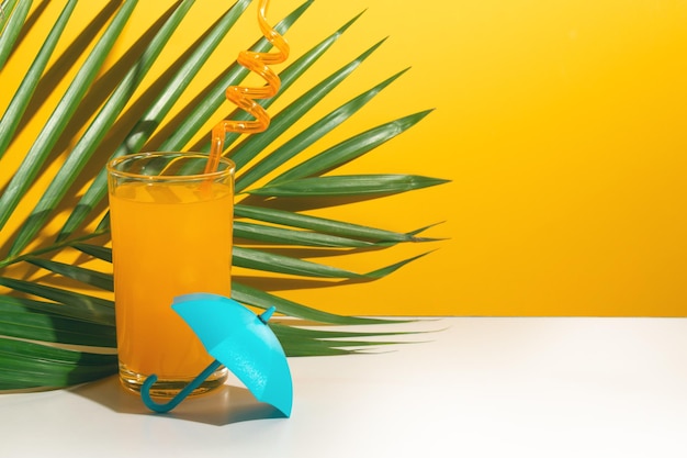 close-up of yellow glass against blue background