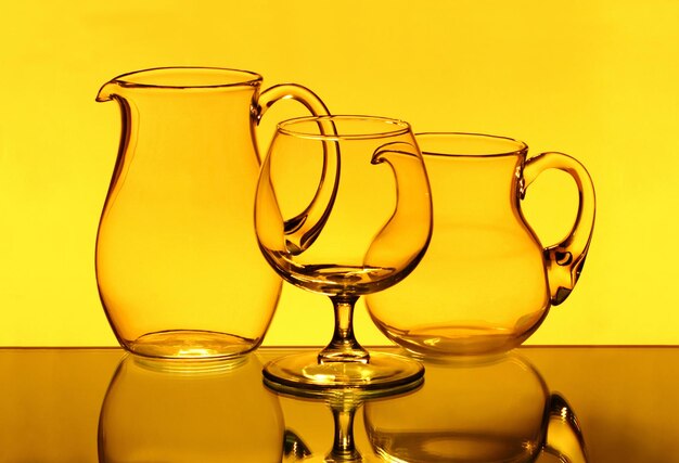 Close-up of yellow glass against white background