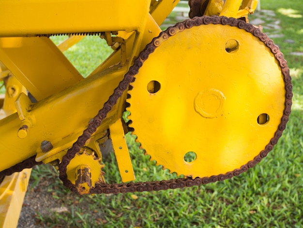 Close-up of yellow machinery in playground