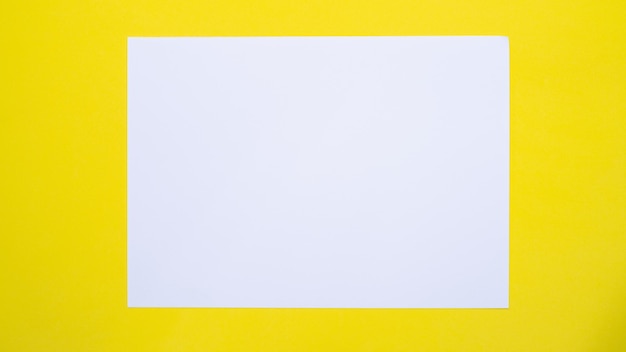 Photo close-up of yellow paper against blue background