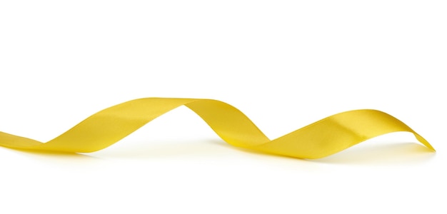 Photo close-up of yellow paper over white background