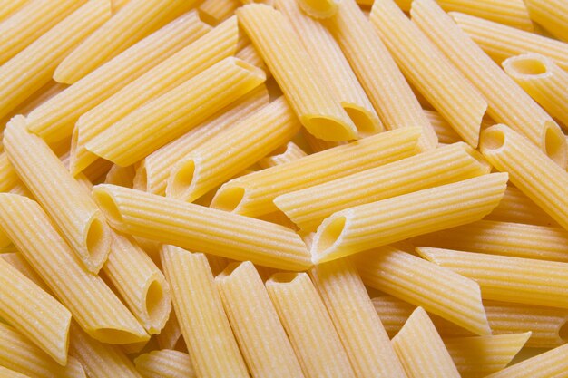 Close up of yellow raw italian pasta