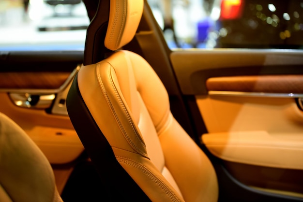Close-up of yellow seat in car