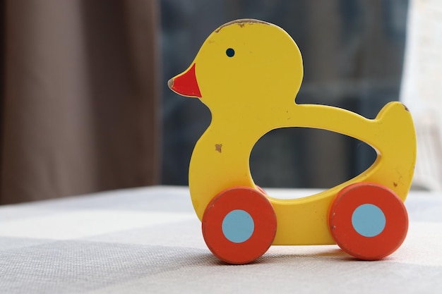 Close-up of yellow toy on table