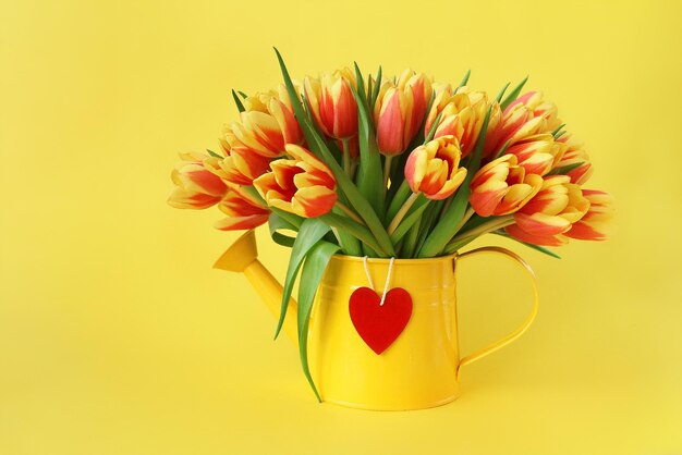 Close-up of yellow tulips in vase