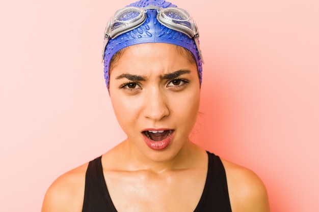 Close up of a young arab swimmer woman