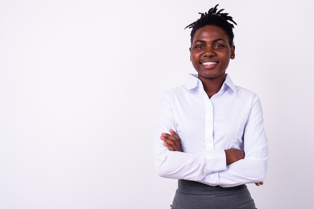 Close up of young beautiful African businesswoman isolated